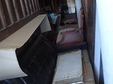 a lot of chairs that are sitting in a room