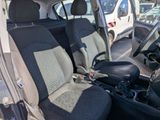 two seats in the back of a small car