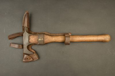 a hammer and a pliers on a table