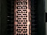 a hair brush that is inside of a box