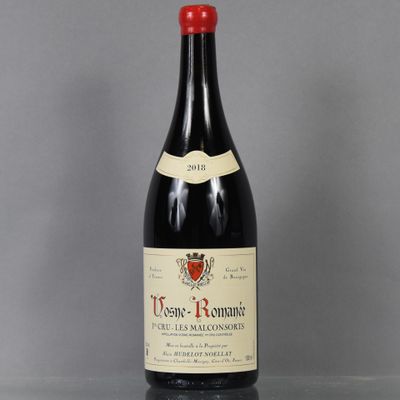 a bottle of wine that is sitting on a table