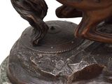 a statue of a horse that is on a pedestal