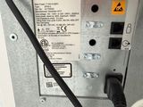 a close up of a power strip with wires attached to it
