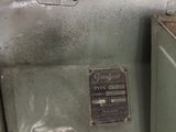 an old machine that is sitting in the garage