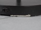 a close up of a black object on a table