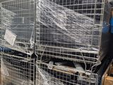 many boxes and crates in the warehouse with plastic wrap on them