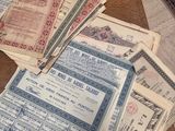 a pile of old papers sitting on a table