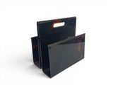 two black plastic bags with handles and handles on a white background