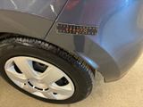 a close up of a car with a sticker on the side of it