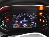 a close up of a car ' s dashboard with a speedometer