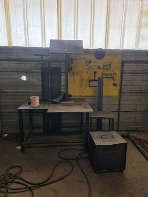 a computer sitting on a table in a room