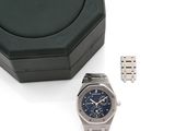 an image of a watch and a watch box on a white surface