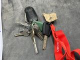 a bunch of keys that are laying on the floor