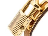 a close up of a watch with a lock on it