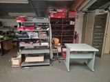 a room with a desk, shelves, and a chair in it