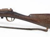 an old rifle with a wooden barrel on a white background