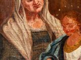 an old painting of a woman holding a baby in her lap