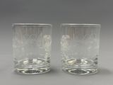 pair of etched glass tumblers with floral design