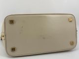 an image of a white purse sitting on top of a white table