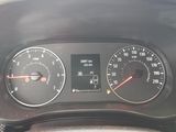 a close up of a car dashboard with various gauges