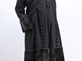 vintage black coat with faux trims and buttons on a mannequin mannequin mannequin mannequin mannequin mannequin mannequin