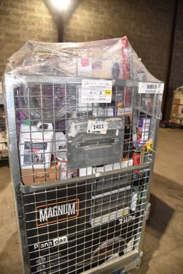 a metal cart with many items in it in a warehouse