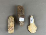 three different types of rocks on a table with labels on them