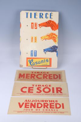 three boxes of cigarettes are sitting on a white surface