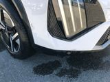a close up view of a car ' s front bumper