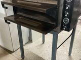 a large oven that is sitting in a room
