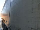 a semi truck that is parked in a garage