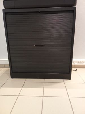 an image of a tv sitting on top of a cabinet