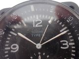 a close up of a black watch with white numbers on it