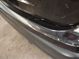 a close up of the front bumper of a car