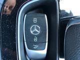 a close up of a car door handle with a remote control