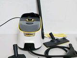 a vacuum that is sitting on a table next to other items