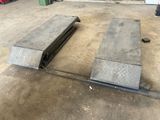 a concrete bench sitting in the middle of a garage