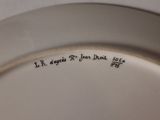 a white plate with writing on it that says i ' m sorry to you, don ' t
