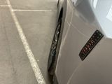 a close up of a car with a sticker on it