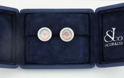 an image of a pair of cuff watches in a box