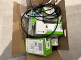 a box full of electronic equipment sitting on the floor