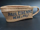 an image of a woven basket bag with a name on it