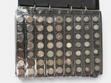 a black case with a lot of coins inside of it