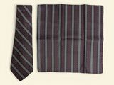 striped neck tie and pocket square on a white background