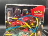 a box of pokemon toys on display on a table