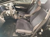 a picture of the inside of a car with the front seats down