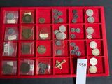 a red box with a lot of coins in it