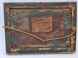 a picture of an old box with a rope around it