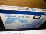a box of creative quilting kit sitting on a table