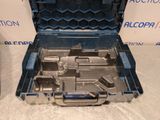 an open tool box with tools in it on a table